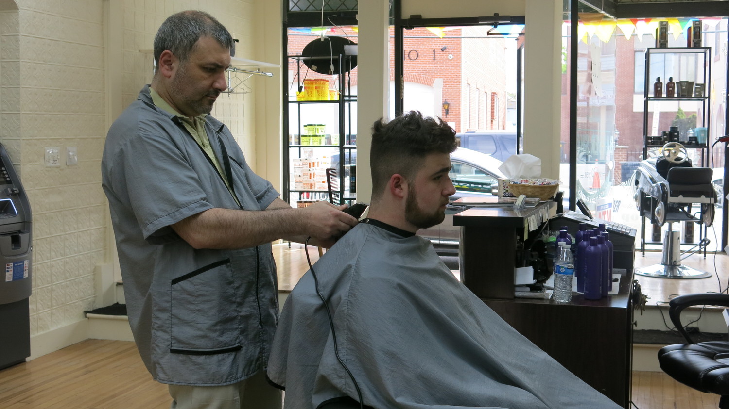 Johnny’s Barber Shop a long way from Russia Herald Community